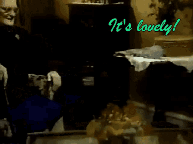 a woman sits in a chair with the words " it 's lovely " written on the bottom