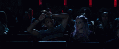 Reaching Over Cara Delevingne GIF - Reaching Over Cara Delevingne Isabelle GIFs