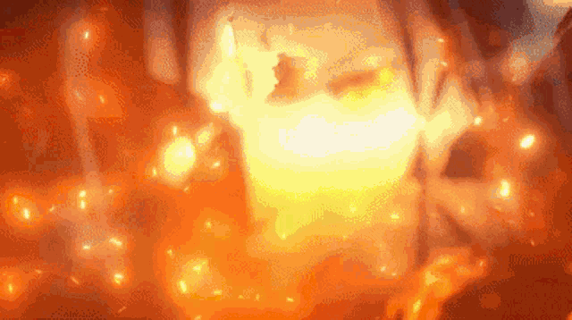 a close up of a person 's face surrounded by flames .