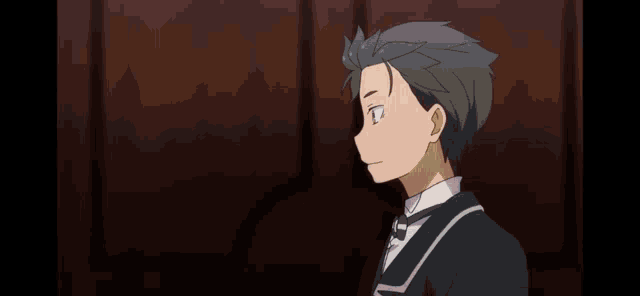 a close up of a boy with his eyes closed