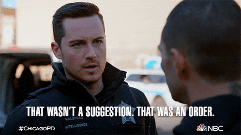 a chicago police officer is talking to another police officer