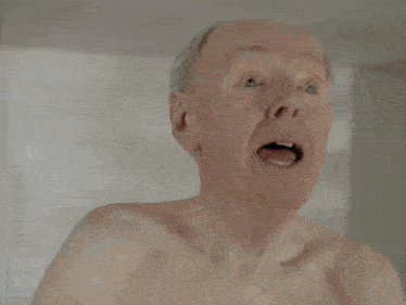 an elderly man stands on the edge of a swimming pool with the words elder abuse behind him