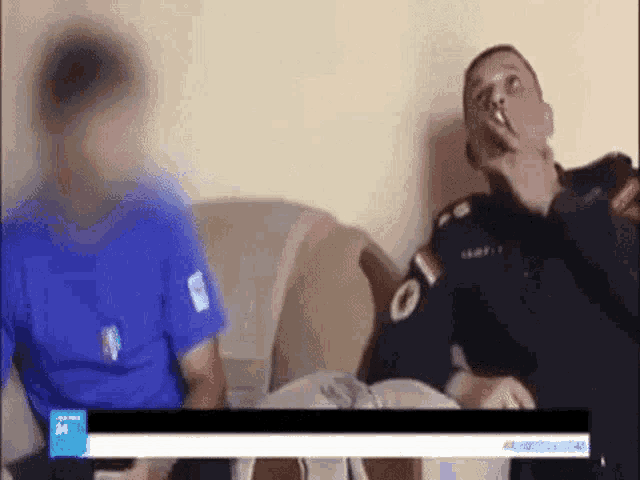 Smoking Officer GIF - Smoking Officer Blured Face GIFs