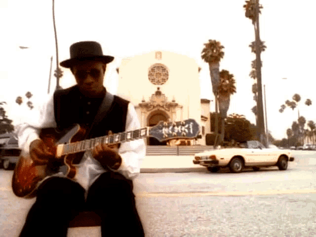 Playing Guitar Performing GIF - Playing Guitar Performing In Front Of The Church GIFs