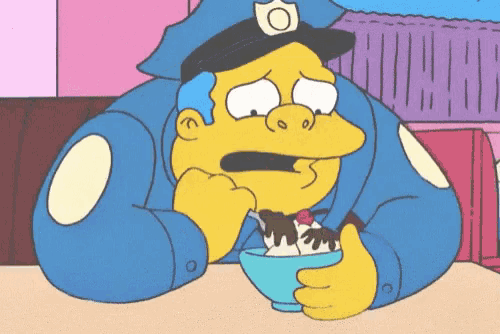 a cartoon character is eating a bowl of ice cream