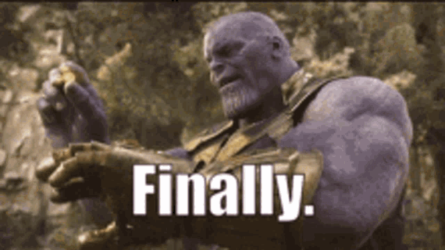 thanos from avengers infinity war is holding a piece of gold and says finally