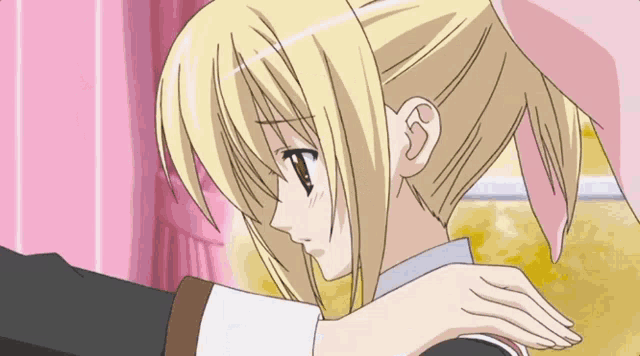 a girl with blonde hair is hugging another girl with pink hair
