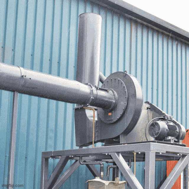 a large fan is sitting outside of a building with imgflip.com at the bottom