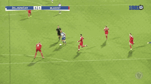 a soccer game is being played and the score is 5 1