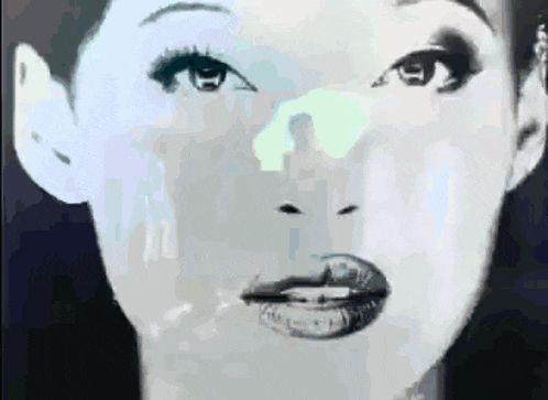 a close up of a woman 's face with a shadow of a man in the background