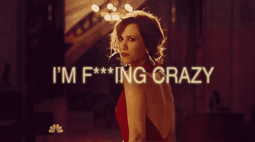 a woman in a red dress with the words i 'm f *** ing crazy above her