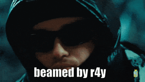 a man wearing sunglasses and a hooded jacket says beamed by r4y