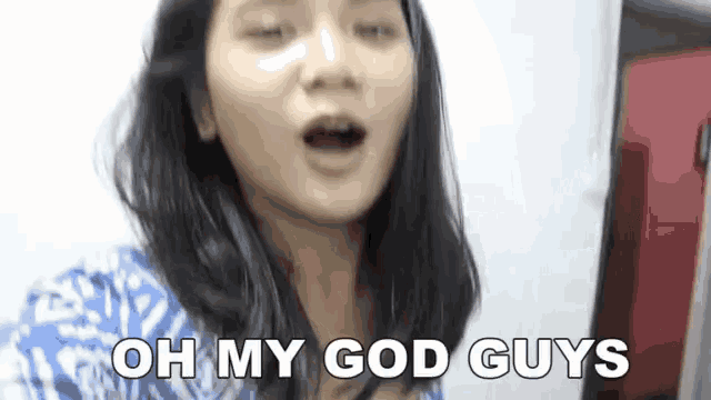 a woman is making a funny face and saying `` oh my god guys '' .
