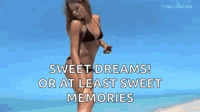 a woman in a bikini is dancing on a beach with the words `` sweet dreams ! or at least sweet memories '' .