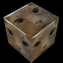 a cube with a picture of a baby 's face and the word ready on it
