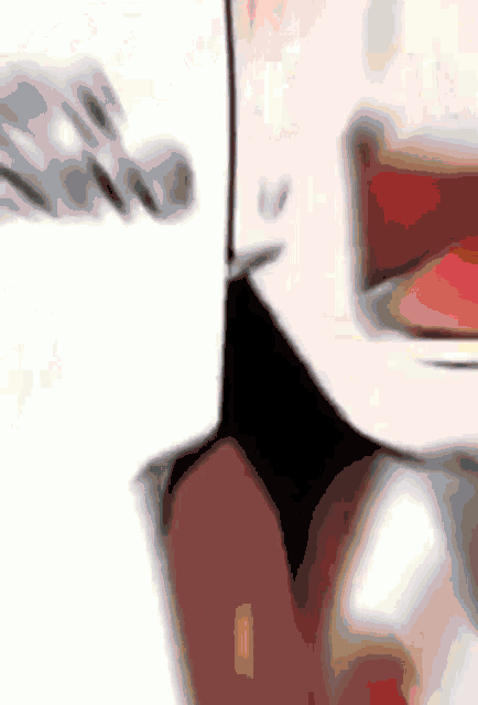 a close up of a person 's face with their mouth open .