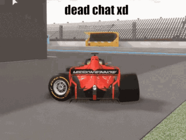 a red race car with the word mission winnow on it