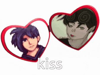 a heart shaped mirror with a picture of a boy and the word kiss