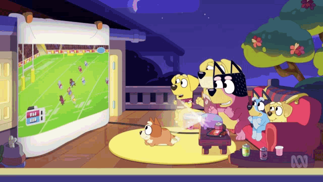 a group of cartoon dogs are watching a football game on a projector screen