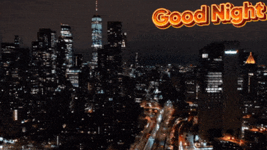 an aerial view of a city at night with the words good night above