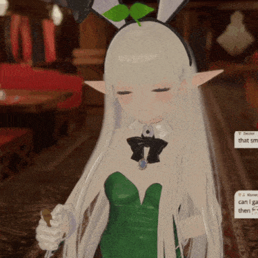 a girl with long white hair is wearing a green dress and a bunny headband
