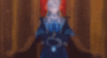 a man in a blue suit is sitting on a red throne