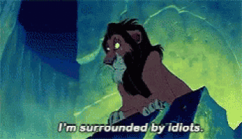 scar from the lion king is surrounded by idiots in a cave .