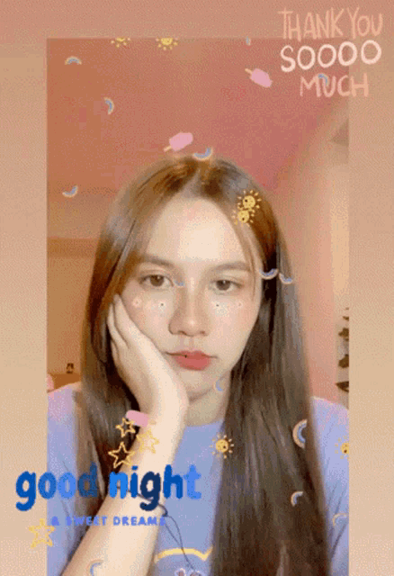 a girl with a purple shirt that says good night on it