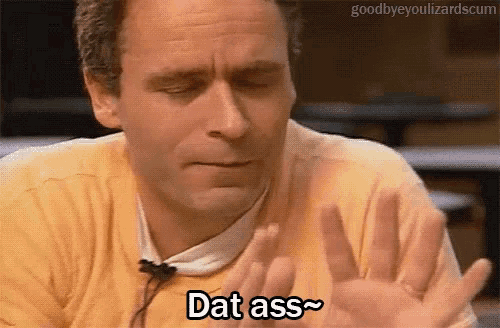 a man in a yellow shirt is saying that ass with his hands