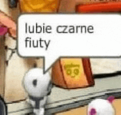 a cartoon character with a speech bubble that says `` lubie czarne fiuty '' .