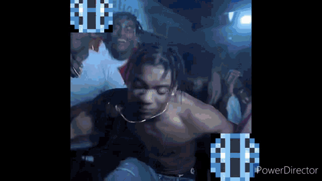 a man in a white shirt is dancing in front of a crowd with a power director watermark