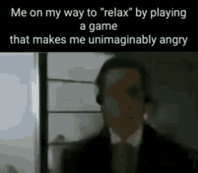 a man in a suit and tie is playing a game that makes him angry .