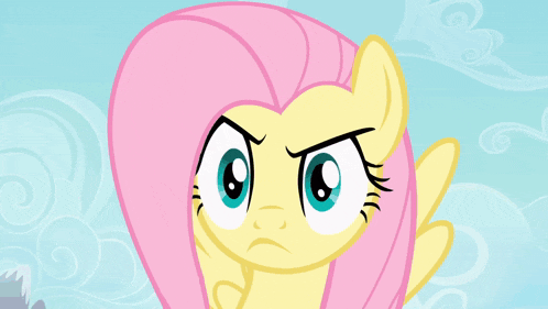 a close up of a cartoon pony with a sad look on her face