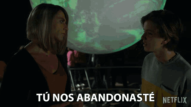 a woman and a boy are standing next to each other with the words " tu nos abandonaste " written on the bottom