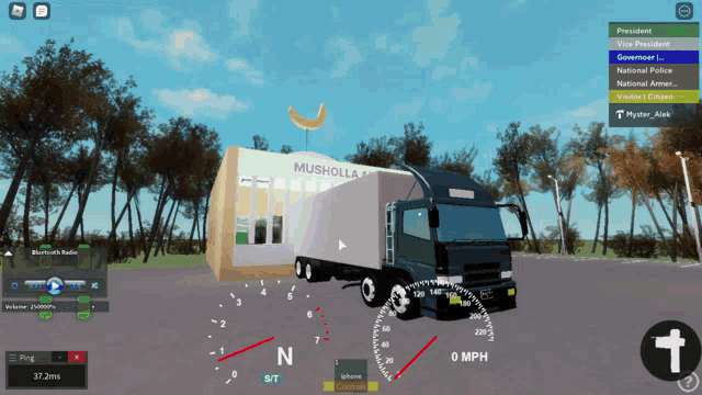 a truck is driving past a building that says musholla on it