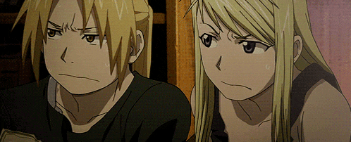 a man and a woman are standing next to each other in a cartoon