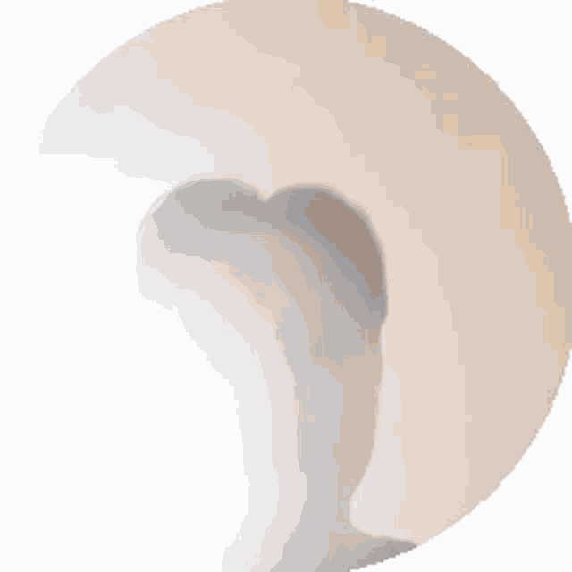 a white circle with a heart shaped hole in the middle