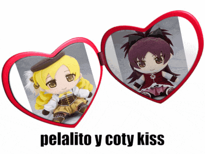 a heart shaped mirror with two dolls on it and the words " pelalito y coty kiss "