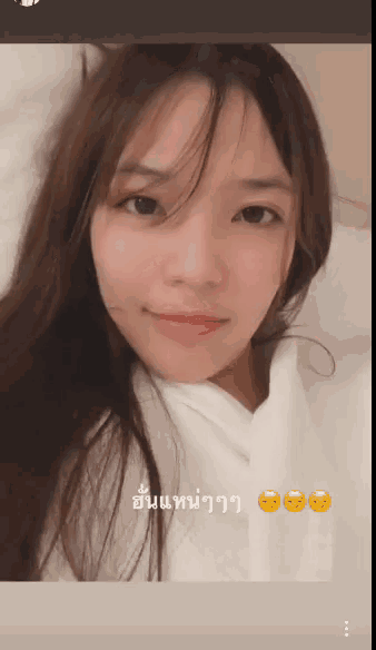a close up of a woman 's face with a caption that says ' a ' on it