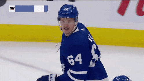 a hockey player with the number 64 on his shirt