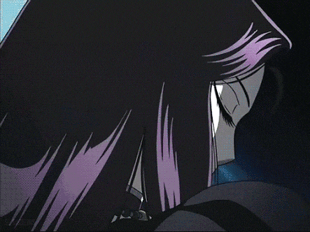 a close up of a woman 's face with purple eyes and the words el catojos below