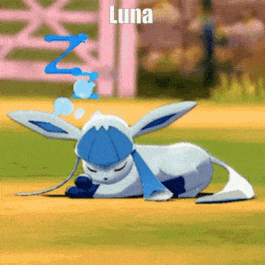 a cartoon bunny is sleeping on the ground with the name luna written above it