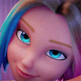 a close up of a girl 's face with blue eyes