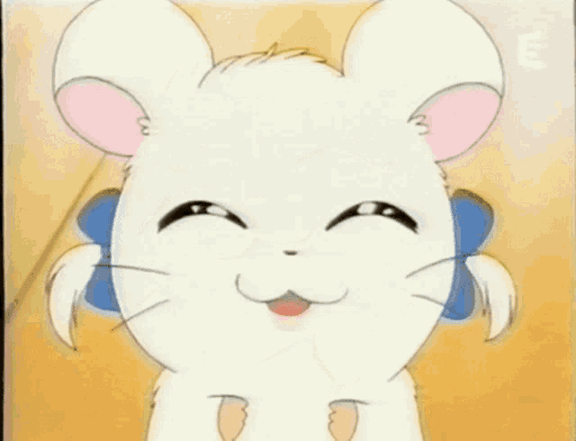 a white cartoon mouse with a blue bow around its ear