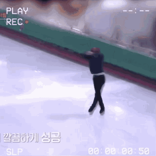 a video of a person ice skating with the words play rec on the top
