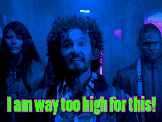 a man with curly hair says " i am way too high for this " while holding a gun