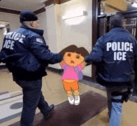 two police officers are holding a picture of dora
