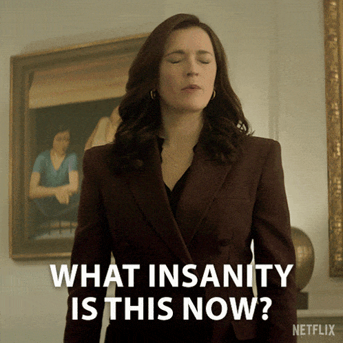 a woman with her eyes closed says " what insanity is this now "