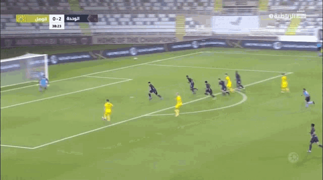 a soccer game is being played in abu dhabi