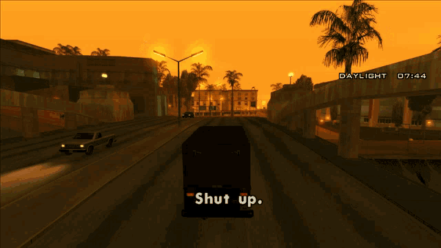 a video game scene with a truck that says shut up on the back
